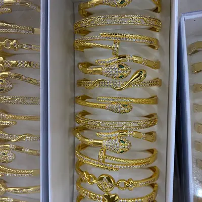 Snake - Patterned Gold Bangle
